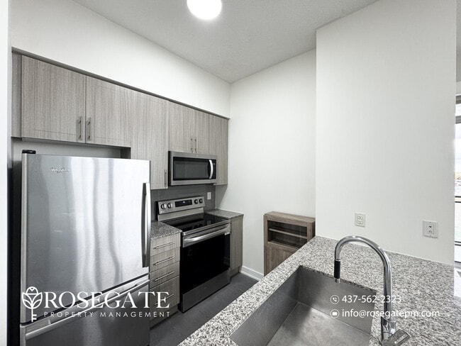 Building Photo - Modern 2-Bedroom Corner Condo with Private...