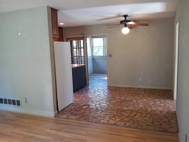 View of Kitchen and Sunroom from Living Area - 2725 Carolyn Dr SE