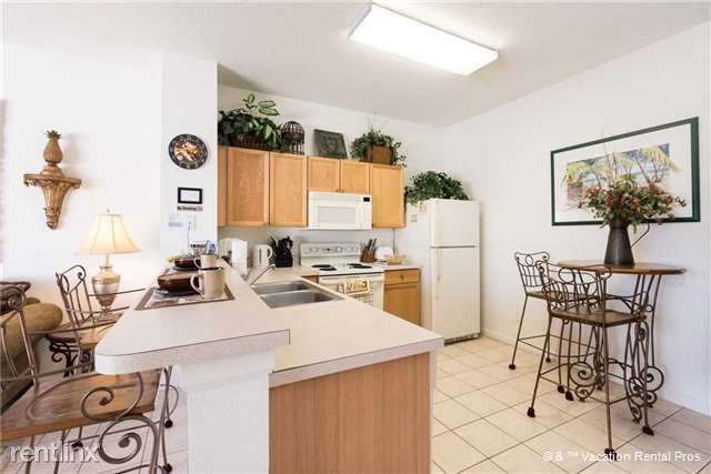 Building Photo - 8108 Princess Palm Ln