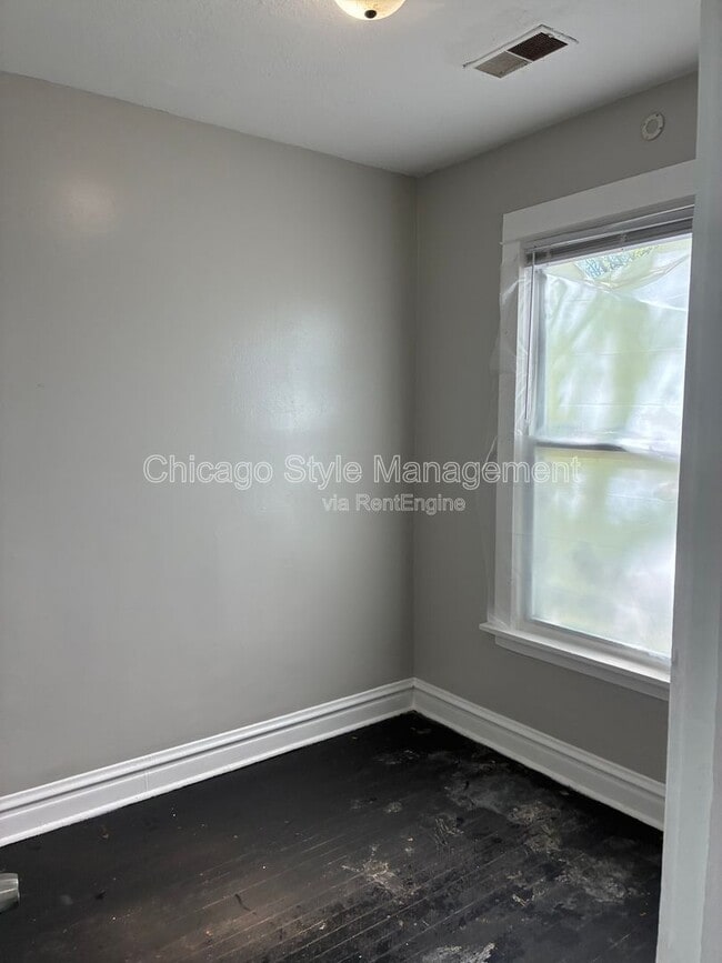 Building Photo - 6952 S Ada St