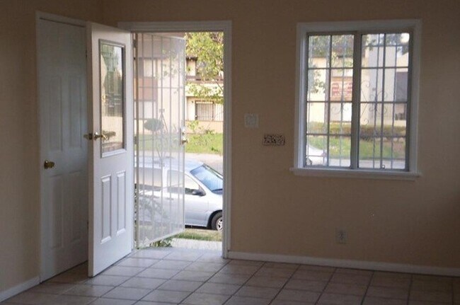 Building Photo - 7823 Normandie Ave