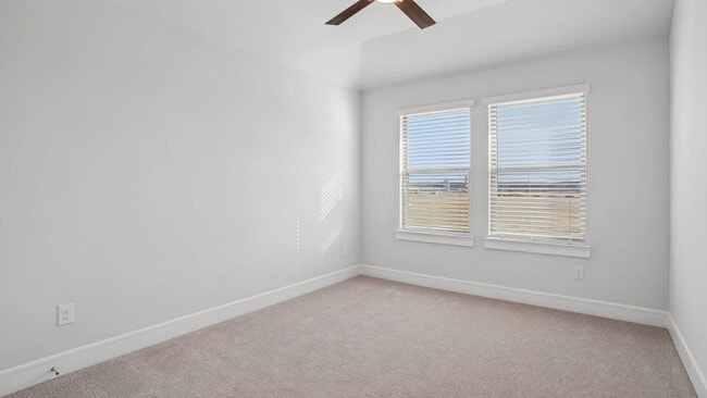 Carpeted Bedroom - The Louise Townhomes