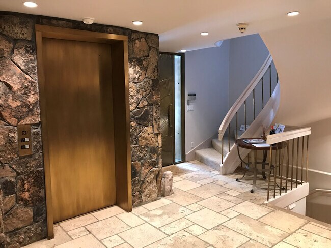 Foyer Elevator & Stairs - 237 Gilbert St