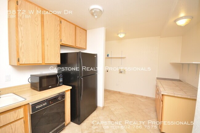 Building Photo - 8872 W Meadow Dr