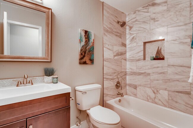 Bathroom with marble tub and surround - 7606 Bethune Ave