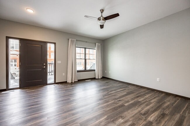 Building Photo - Spacious Townhome with Heated Garage Just ...