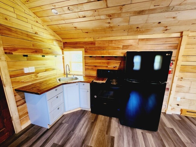 Building Photo - Amazing Cabin with hand Milled Wood right ...