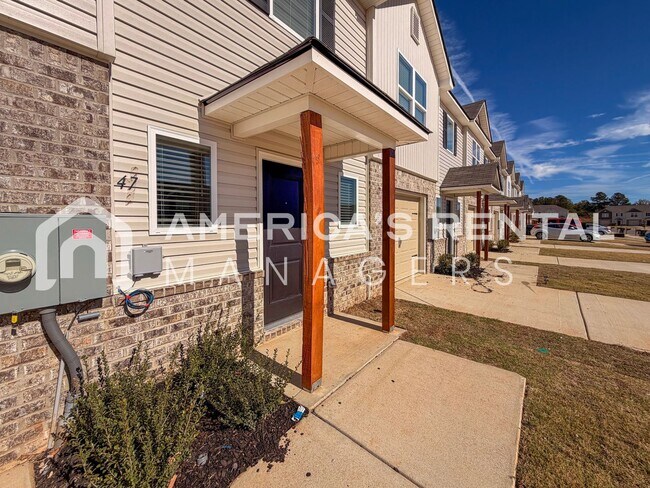 Foto del edificio - DEPOSIT PENDING! MOVE IN SPECIALS! Stylish two level home with open concept living for rent in Li...
