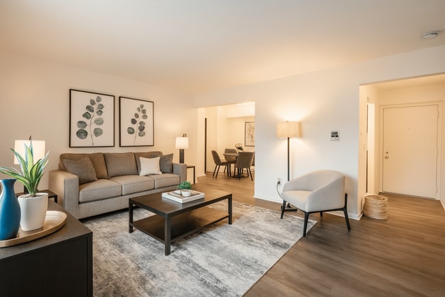 Virtually staged photo to help visualize the space. Apartment is rented unfurnished. - Blue Spruce Apartments