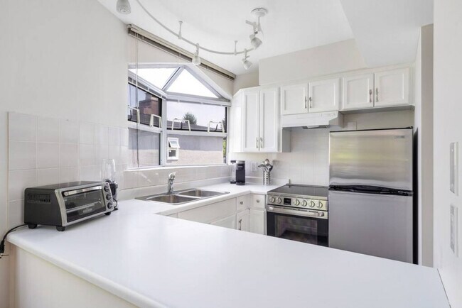 Photo du bâtiment - 1126 W 11th Ave