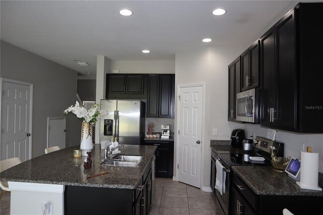 Foto del edificio - 7022 Grand Elm Dr