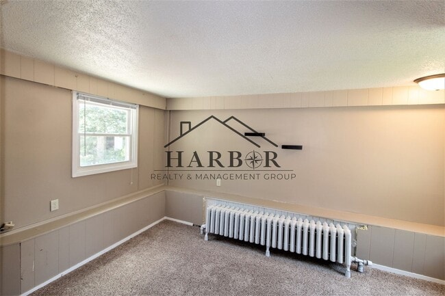 Foto del edificio - Spacious 2-Bedroom Living in the Heart of Rochester