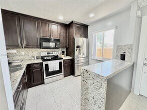 Building Photo - 10991 NW 30th Pl