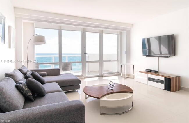 Building Photo - 2 br, 2.5 bath House - 5601 Collins Ave Ap...