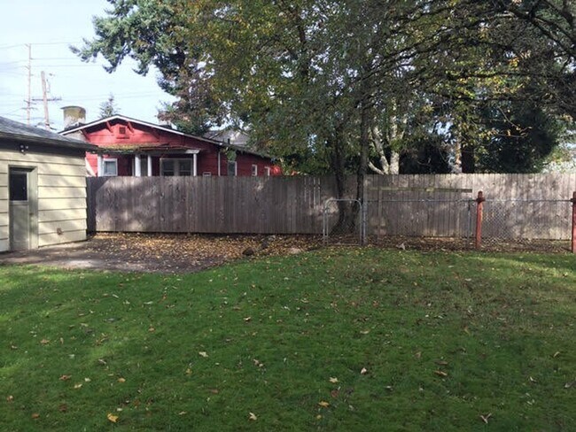 Building Photo - CHARMING & UPDATED; ONE LEVEL, HUGE FENCED...