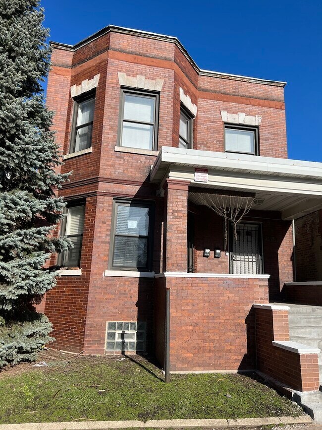 Front of building - 7053 S Eberhart Ave