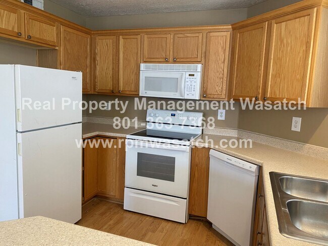 Building Photo - Check Out This Amazing 3 Bedroom 2 Bathroom Condo In Riverton! 50% Off First Month's Rent Move in...