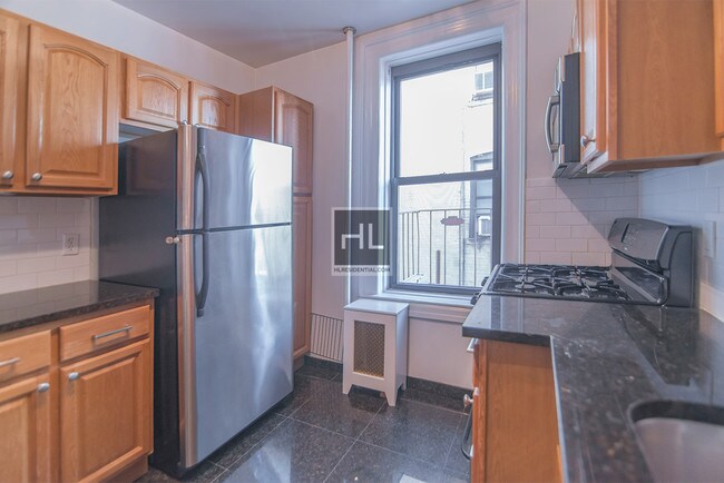 Building Photo - 24-39-39 Steinway St