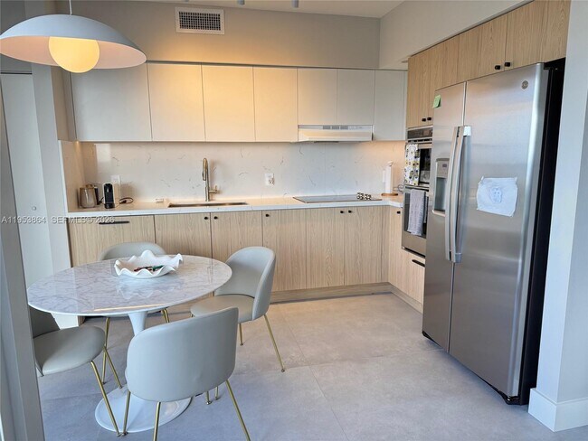 Building Photo - 4779 Collins Ave