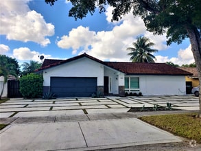 Building Photo - 20130 NW 59th Ct