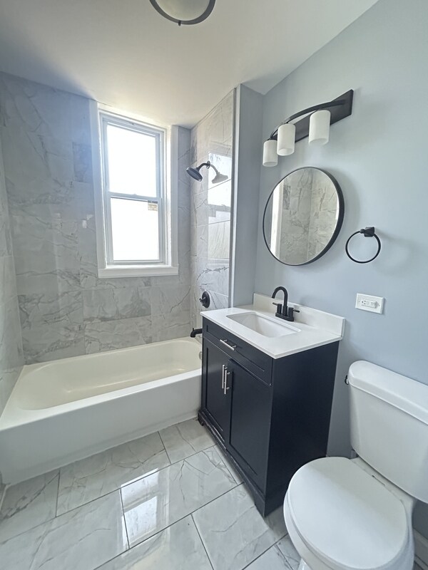 Foto del edificio - 6601 S Langley Ave