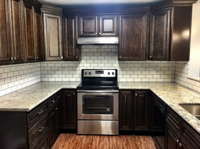 Beautiful granite counter tops and subway backsplash! - 819 Bayard St