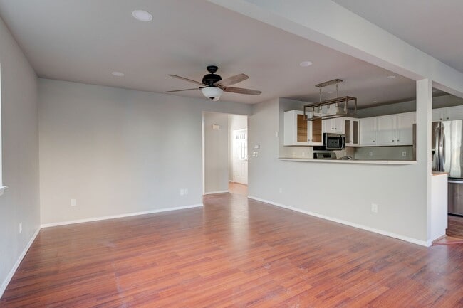 Building Photo - Spacious 4-Bedroom Home with Cozy Backyard...