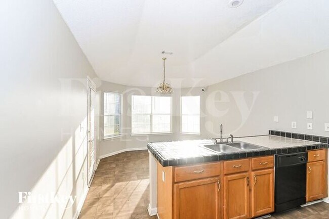 Building Photo - 7678 Breeze Wood Cove