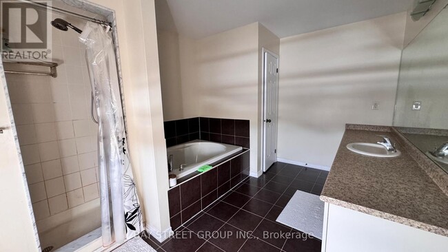 Building Photo - 8859 Dogwood Cres