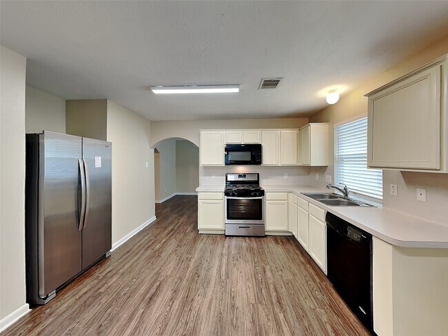 Foto del edificio - 11010 Heather Bluff Ln