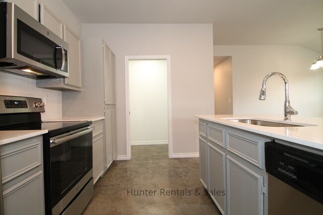 Building Photo - Truly Exceptional! Free Lawn Mowing Servic...