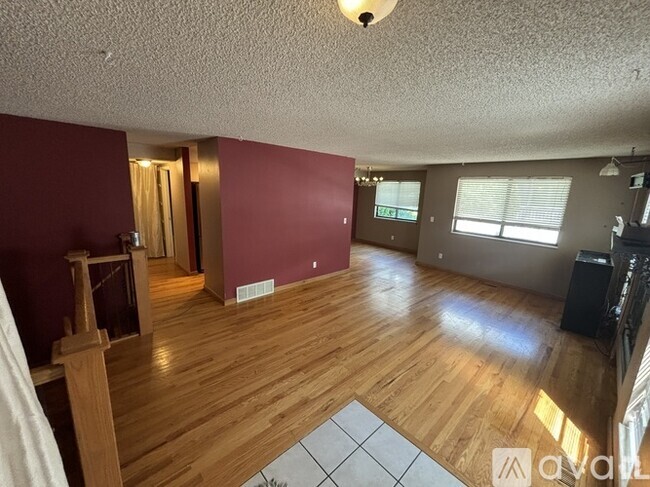 Living room from door - 6620 E Mississippi Ave