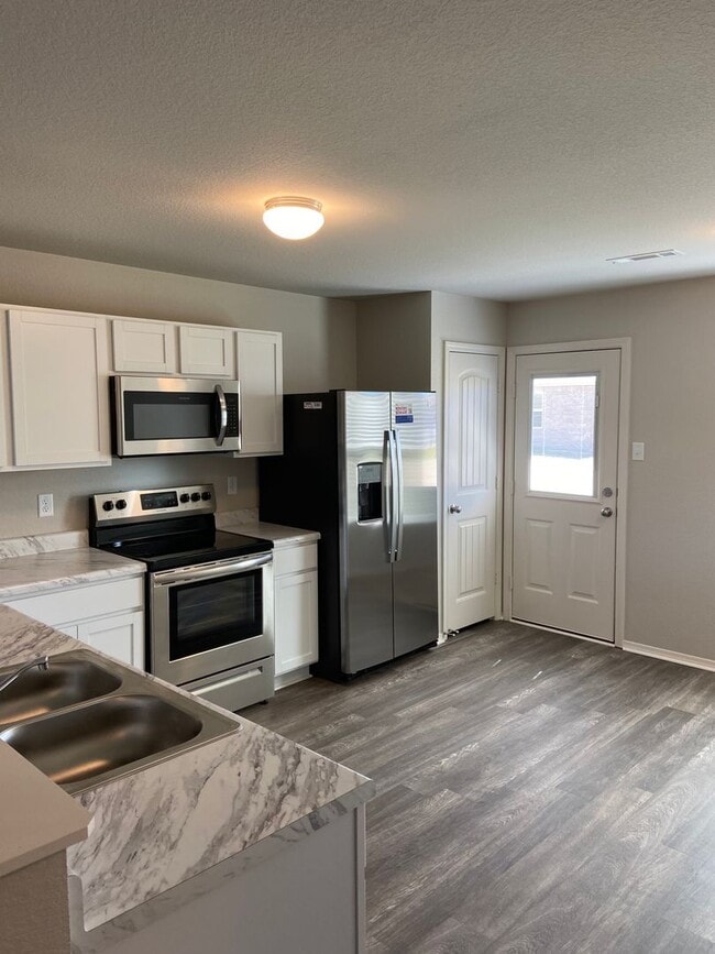Building Photo - Three Bedroom | Two Bath Home in Conrad Court