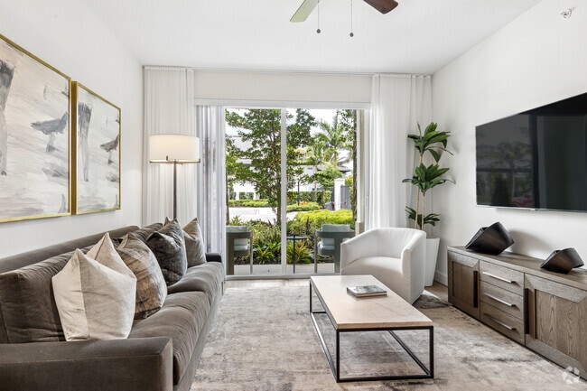 1BR, 1BA - 794SF - Living Room - Town Treeline