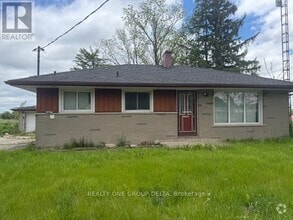 Building Photo - 7121 Wellington Rd 124