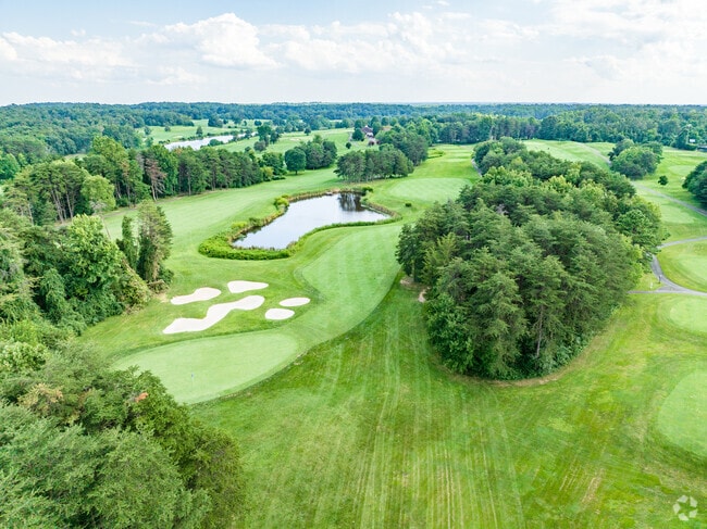 A resident enjoys a day on the green at Twin Lakes Golf Course.