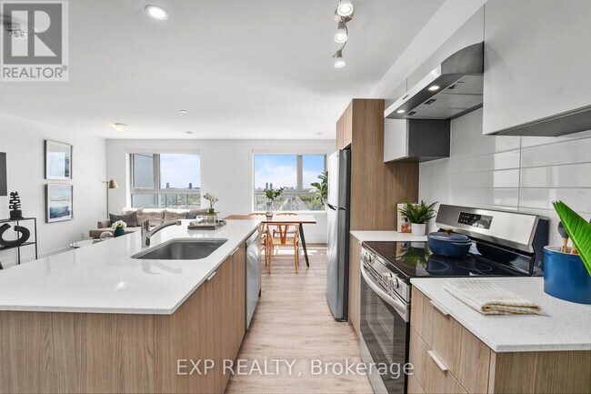 Building Photo - 100-100 Manett Crescent