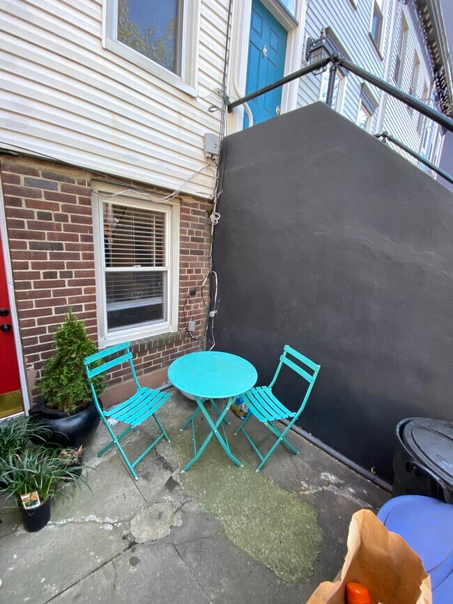 Seating next to front door of apartment - 317 7th St