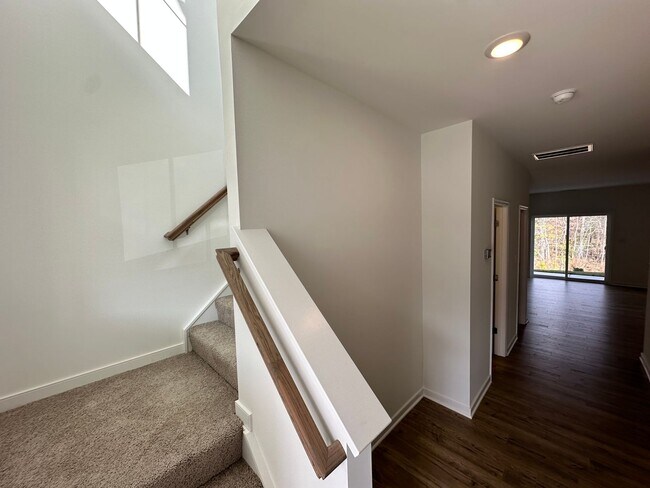 Building Photo - Charming Two-story Townhome, Boasting 3 Be...