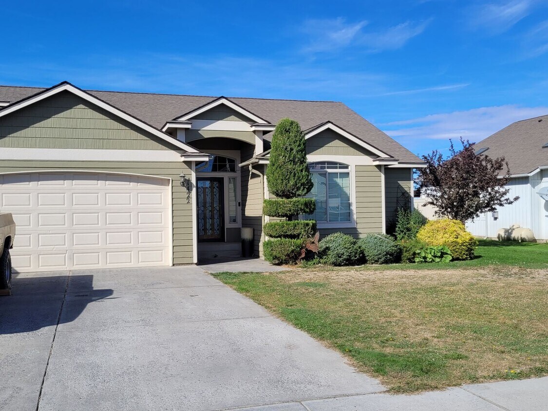 Primary Photo - Triple Car Garage/ Fenced yard/