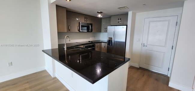 Building Photo - 1250 S Miami Ave