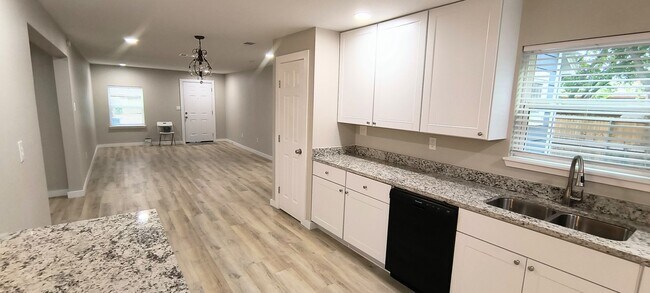 Building Photo - One of a kind 4 bedroom 3 bath house walki...