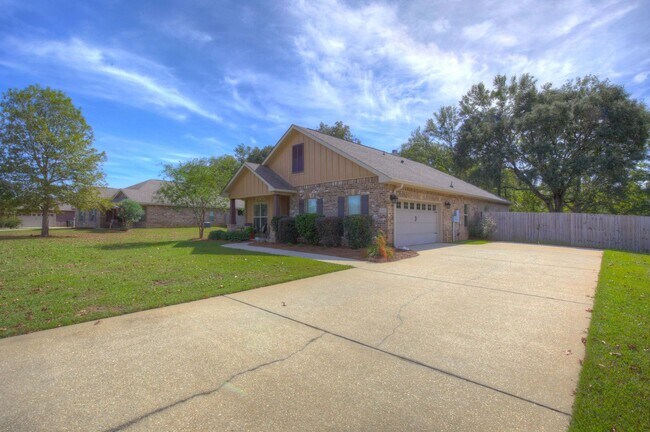 Building Photo - Three bedroom two bath split floor plan