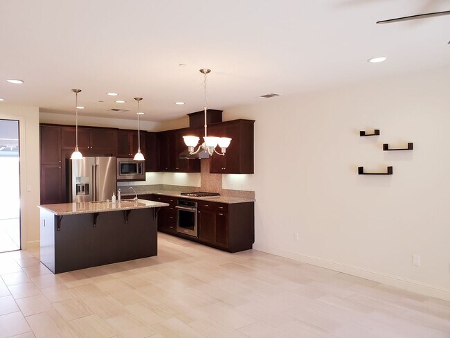 Building Photo - Impressive Two-Story, Townhome in Cantera ...