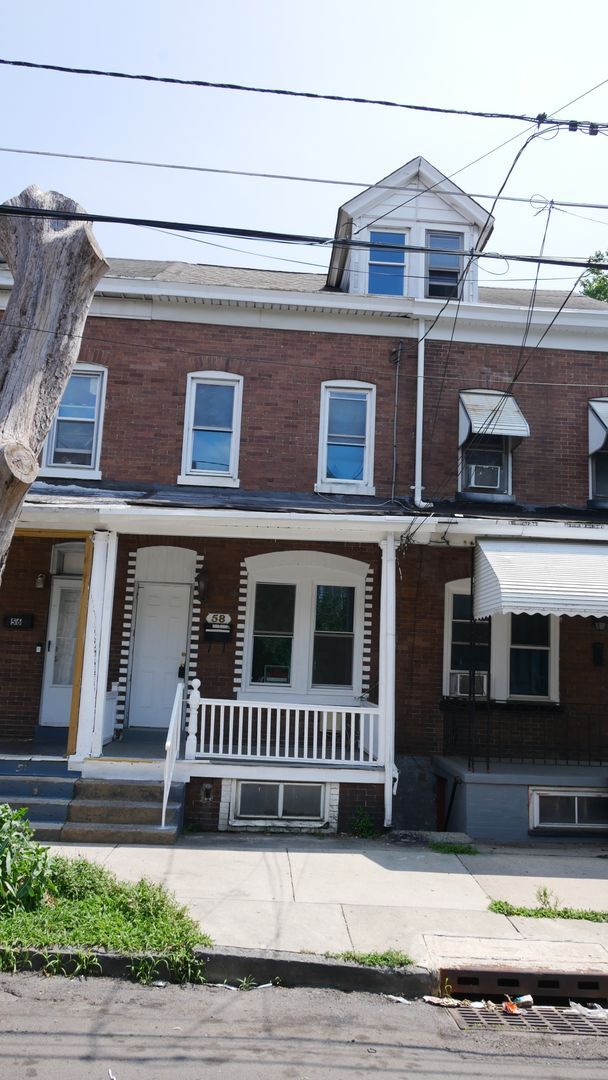 Building Photo - Completely Renovated Interior Row House 4B...