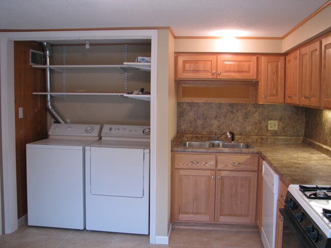 Washer and Dryer (has louvered doors) - 1810 74th St