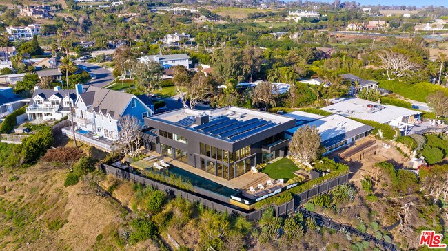 Building Photo - 6463 Surfside Way