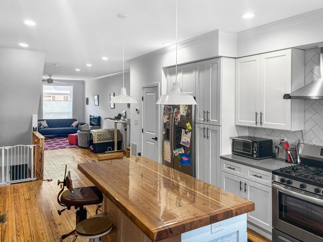 Perfect main floor entertainment space flowing from kitchen to living area. - 1616 Webster St