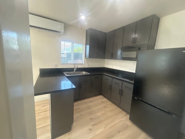 New counter and ,cabinets - 8901 Firestone Plz