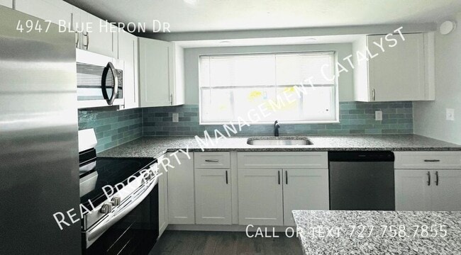 Building Photo - 4947 Blue Heron Dr
